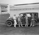 06-Studebaker and race fans in front of Jockey Club (Churchill Downs) 1926